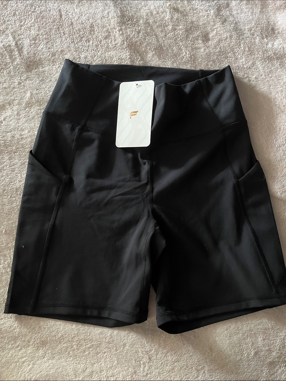 Fabletics Black High-Rise Bike Shorts with Side Pockets